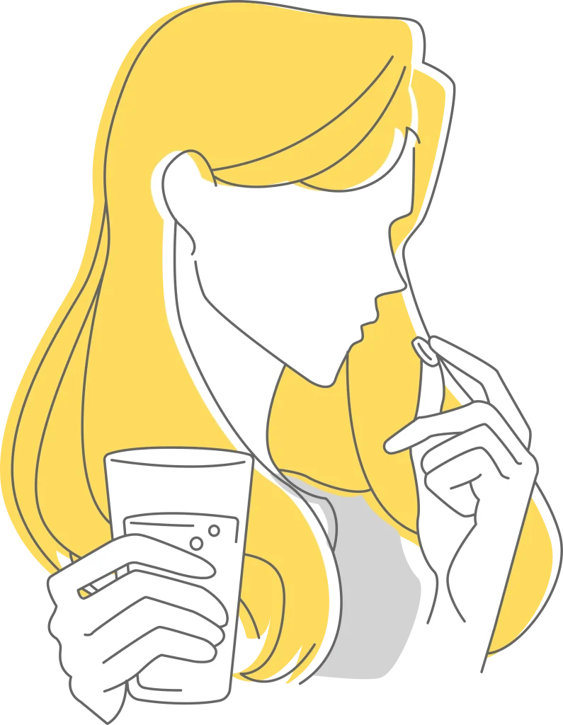 サプリを飲む女性